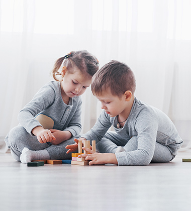 two children with Custom Fabrics